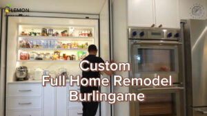 Completed luxury open-concept kitchen remodel in Burlingame featuring custom quartzite stone countertops, handmade cabinets, and Thermador stainless steel appliances by Lemon Remodeling.
